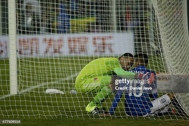 David Ospina of Colombia helps Neymar of Brazil during the 2015 Copa America Chile Group C match between Brazil and Colombia at Monumental David...