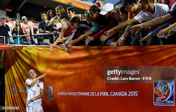 Veronica Boquete of Spain throws her socks to the fans after loosing the FIFA Women's World Cup 2015 Group E match between Korea Republic and Spain...