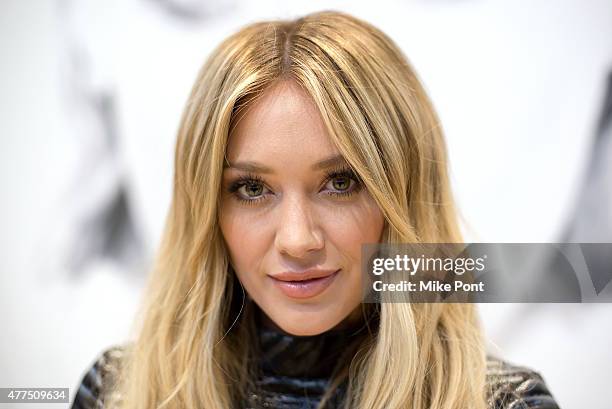 Hilary Duff attends her "Breathe In, Breathe Out" CD signing event at the Smith Haven Mall on June 17, 2015 in Lake Grove, New York.