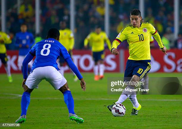 James Rodriguez of Colombia fights for the ball with Elias of Brazil during the 2015 Copa America Chile Group C match between Brazil and Colombia at...