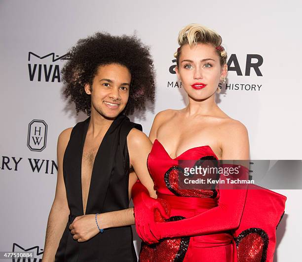 Miley Cyrus and Tyler Ford attend the 2015 amfAR Inspiration Gala New York at Spring Studios on June 16, 2015 in New York City.