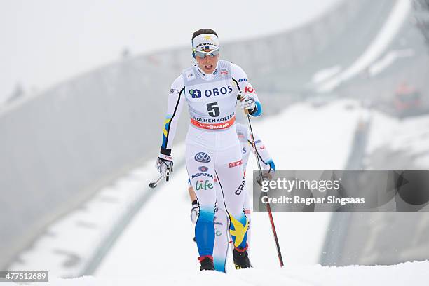 Charlotte Kalla of Sweden competes during the FIS Cross-Country World Cup Ladies 30 km Mass Start Classic on March 9, 2014 in Oslo, Norway.