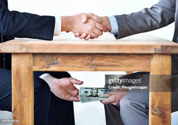 under-the-table transactions... - corruption stockfoto's en -beelden