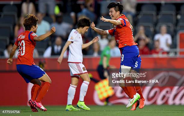 Sooyun Kim of Korea celebrates with team mates after scoring her teams second goal during the FIFA Women's World Cup 2015 Group E match between Korea...