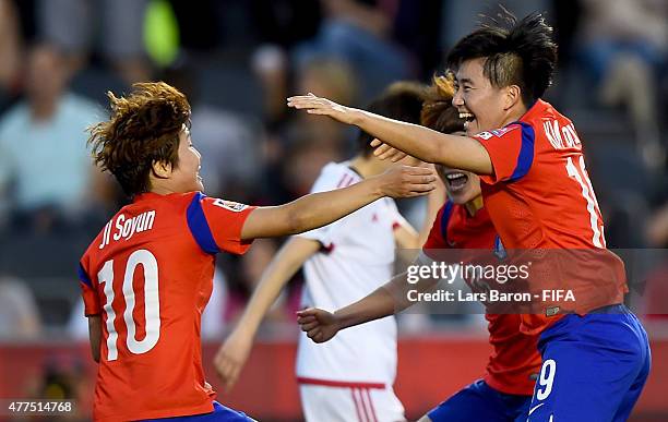 Sooyun Kim of Korea celebrates with team mates after scoring her teams second goal during the FIFA Women's World Cup 2015 Group E match between Korea...