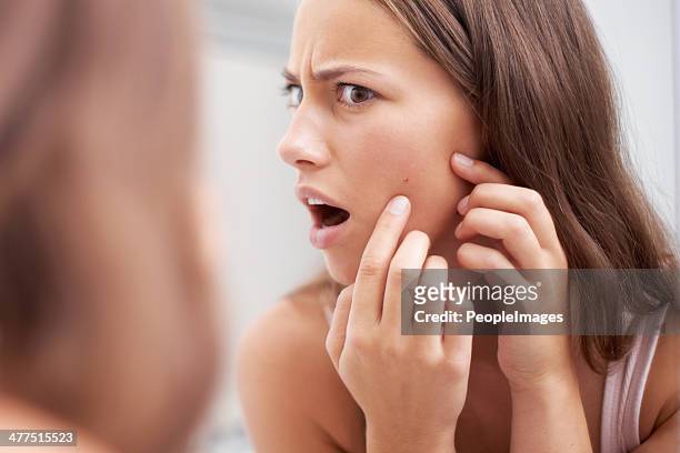 what? a pimple?! - acne stockfoto's en -beelden