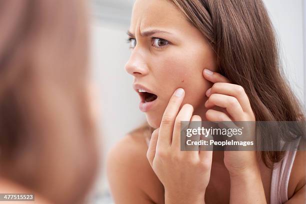 what? a pimple?! - acnes stock pictures, royalty-free photos & images