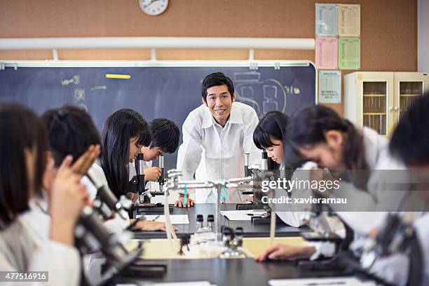 proud japanese teacher - science teacher stock pictures, royalty-free photos & images