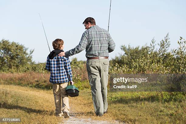 padre e hijo ir de pesca - fishing for leave fotografías e imágenes de stock