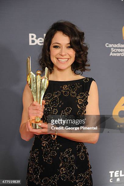 Tatiana Maslany, winner of the Best Perfomance by an Actress in a Continuing Leading Dramatic Role poses in the press room at the 2014 Canadian...