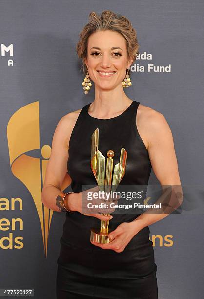 Zoie Palmer, winner of the Fan Choice Award for the Favourtie Canadian Screen Star, poses in the press room at the 2014 Canadian Screen Awards at...