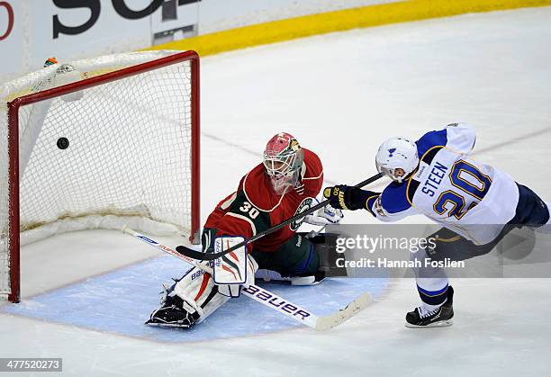 Alexander Steen of the St. Louis Blues scores a goal against Ilya Bryzgalov of the Minnesota Wild during the shootout of the game on March 9, 2014 at...