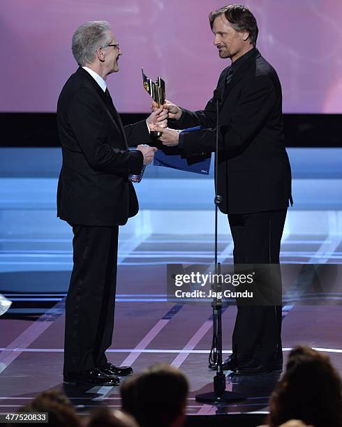 Viggo Mortensen presents the Lifetime Acheievement award to David Cronenberg at the 2014 Canadian Screen Awards at Sony Centre for the Performing...