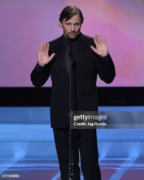 Viggo Mortensen presents the Lifetime Acheievement award to David Cronenberg at the 2014 Canadian Screen Awards at Sony Centre for the Performing...
