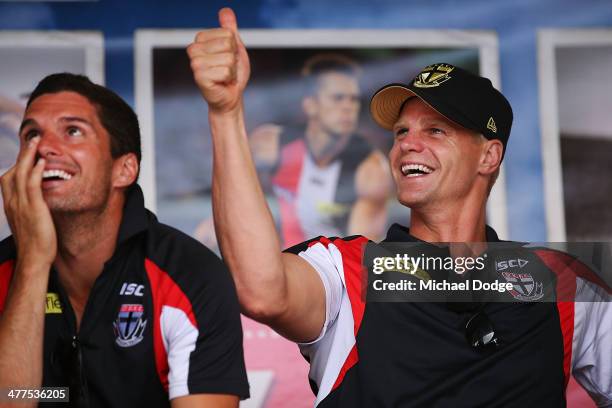 Leigh Montagna and Nick Riewoldt react during a St Kilda Saints AFL Fan Day at Frankston Foreshore on March 10, 2014 in Melbourne, Australia.