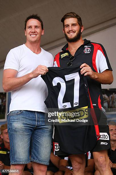 Josh Bruce poses with Jason Blake after receiving his jumper during a St Kilda Saints AFL Fan Day at Frankston Foreshore on March 10, 2014 in...