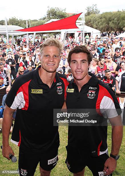 Nick Riewoldt and Lenny Hayes pose on stage during a St Kilda Saints AFL Fan Day at Frankston Foreshore on March 10, 2014 in Melbourne, Australia.