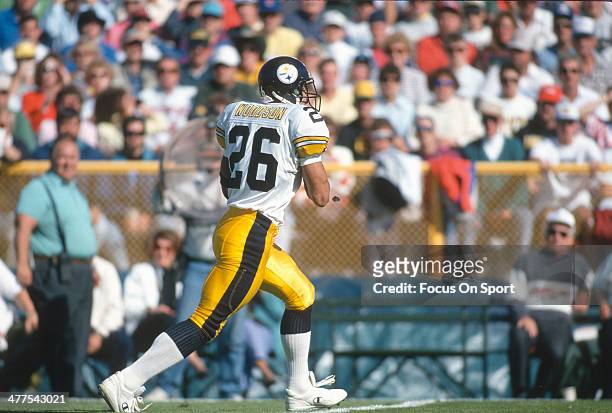 Rod Woodson of the Pittsburgh Steelers runs with the ball during an NFL football game circa 1988. Woodson played for the Steelers from 1987-96.