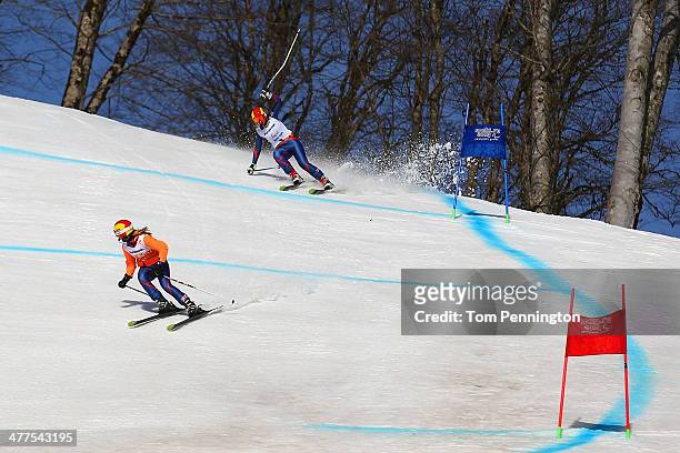 Kelly Gallagher of Great Britain and guide Charlotte Evans in the Women's Super-G - Visually Impaired during day three of Sochi 2014 Paralympic...