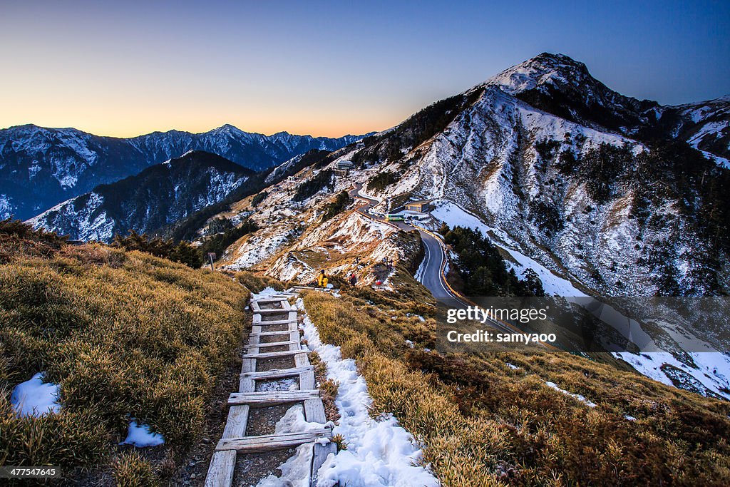 Ladder to mountain top in the snow