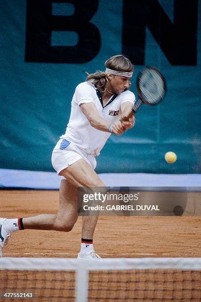 Swedish's Bjorn Borg returns to Italian's Corado Barazzutti during their French tennis Open quarter-final match at the Rolland Garros stadium in...