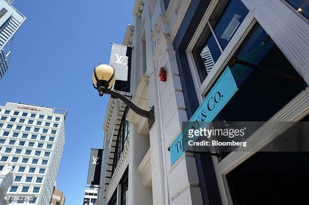 Tiffany & Co. Store, right, stands next to an LVMH Moet Hennessy Louis Vuitton SA store on King Street in Perth, Australia, on Thursday, March 6,...