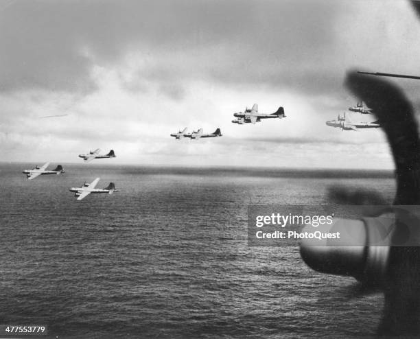 View of a group of B-29 bombers in flight, en route to Saipan, over the Pacific Ocean, January 15, 1945.