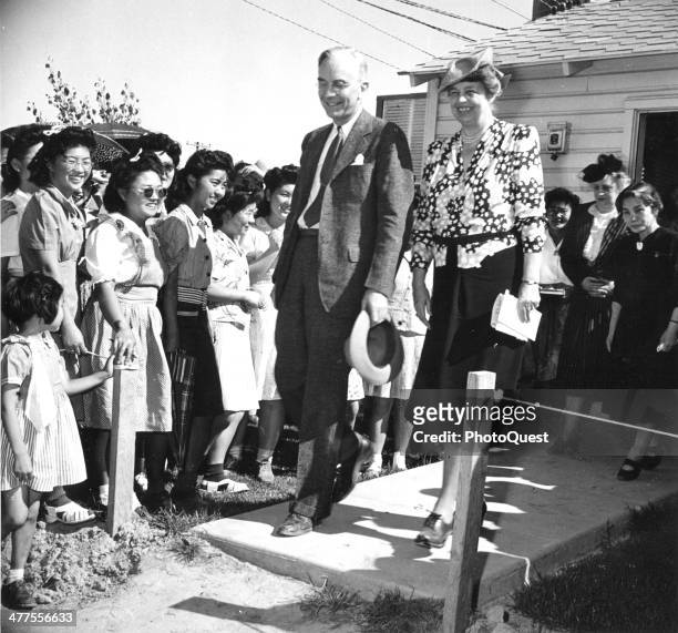 Japanese-American internees at the Gila River Relocation Center in Pinal County, Arizona, greet First Lady Eleanor Roosevelt and Dillon S Myer,...
