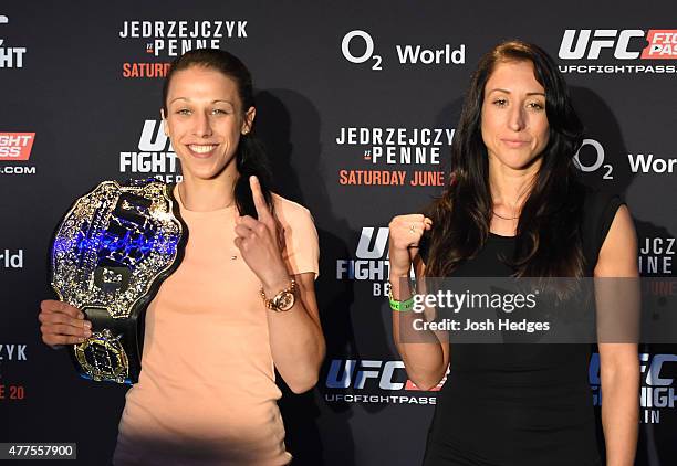 Opponents Joanna Jedrzejczyk of Poland and Jessica Penne of the United States pose for photos during the UFC Berlin Ultimate Media Day at the O2...