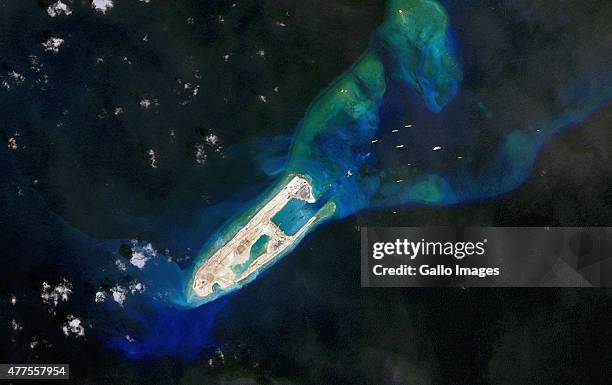 Satellite view of a South China Sea land reclamation project happening on the Fiery Cross Reef by the Chinese on February 22, 2015 in Fiery Cross...