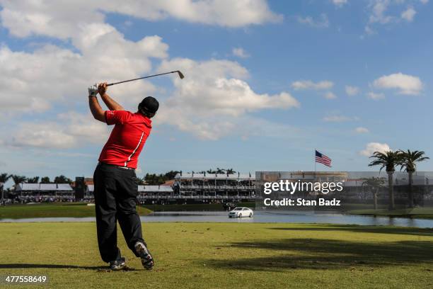 Patrick Reed tees off on the ninth hole during the final round of the World Golf Championships-Cadillac Championship at Blue Monster, Trump National...