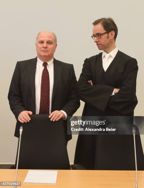 Former manager of Bayern Muenchen Uli Hoeness speaks with his lawyer Markus Gotzens before the start of his trial at the justice palace court house...