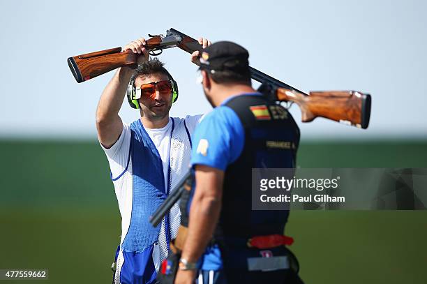 Manuel Mancini of San Marino celebrates winning the bronze medal after a shootout against Alberto Fernandez of Spain in the Mixed Team Trap bronze...