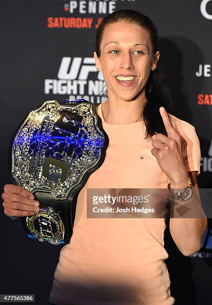 Women's strawweight champion Joanna Jedrzejczyk of Poland poses for photos during the UFC Berlin Ultimate Media Day at the O2 World on June 18, 2015...