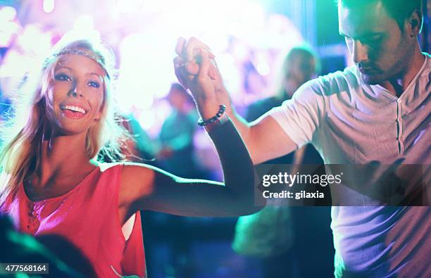two people dancing at concert. - latin american dancing stock pictures, royalty-free photos & images