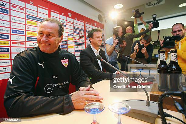 New head coach Huub Stevens ands manager Fredi Bobic of Stuttgart arrive for a press conference at Mercedes-Benz Arena on March 10, 2014 in...