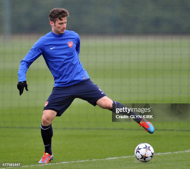 Arsenal's French striker Olivier Giroud controls the ball during a training session at Arsenal's training ground at London Colney, north of London,...