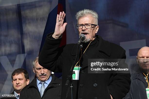 Russian writer and opposition leader Eduard Limonov takes part in a rally of pro-Kremlin, nationalists and veteran movements in support of Vladimir...