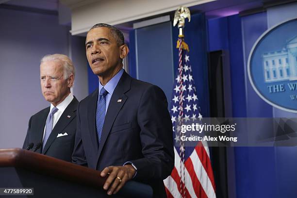 President Barack Obama, flanked by Vice President Joe Biden, makes a statement regarding the shooting in Charleston, South Carolina, June 18, 2015 at...