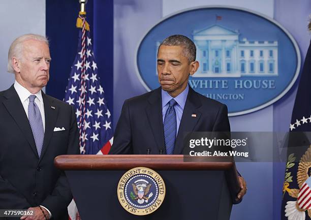 President Barack Obama, flanked by Vice President Joe Biden, makes a statement regarding the shooting in Charleston, South Carolina, June 18, 2015 at...