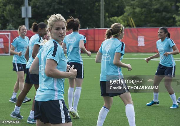 France's Amandine Henry takes part in a training session in Ottawa on June 18, 2015 three days before France's Round of 16 2015 FIFA Women's World...