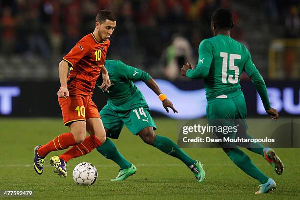 Eden Hazard of Belgium and Christopher Aurier of Ivory Coast battle for the ball during the International Friendly match between Belgium and Ivory...