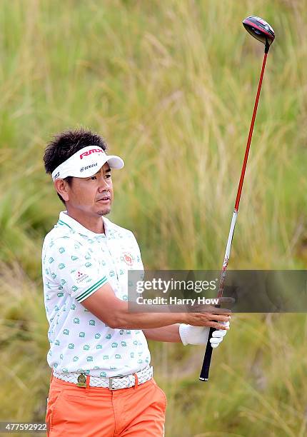 Hiroyuki Fujita of Japan watches his tee shot on the sixth hole during the first round of the 115th U.S. Open Championship at Chambers Bay on June...