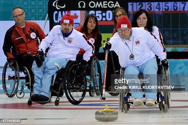 Norway's Jostein Stordahl pushes the stone during the match between Canada and Norway in Wheelchair Curling at XI Paralympic Olympic games in the Ice...