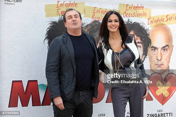 Producer Maria Grazia Cucinotta and husband Giulio Violati attend 'Maldamore' photocall at Villa Borghese on March 10, 2014 in Rome, Italy.