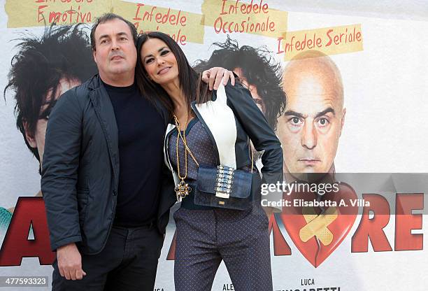 Producer Maria Grazia Cucinotta and husband Giulio Violati attend 'Maldamore' photocall at Villa Borghese on March 10, 2014 in Rome, Italy.