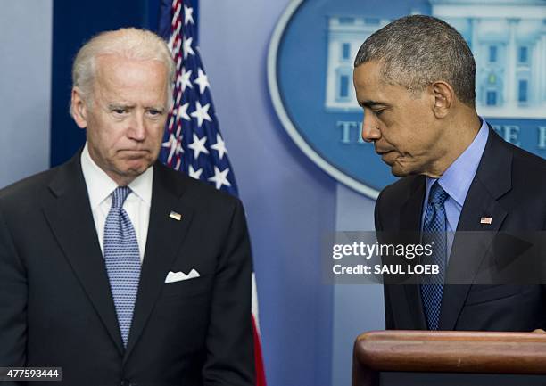 President Barack Obama leaves after speaking alongside US Vice President Joe Biden about the shooting deaths of nine people at a historic black...