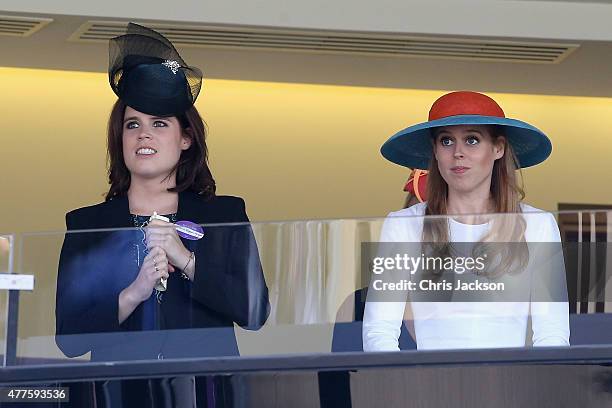 Princess Eugenie and Princess Beatrice in watch the Queen's horse in the final race as they attend Ladies Day on day 3 of Royal Ascot at Ascot...