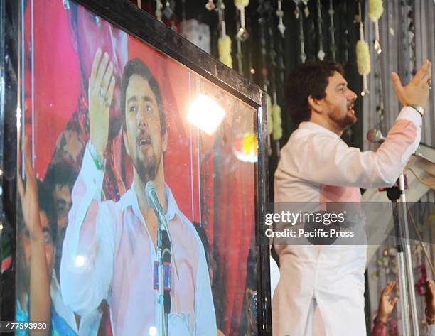 Pakistani Shayar e Ahlebait Farhan Ali Waris reciting Manqabat Khuwani during The International Jashan e Muntazir Program at Chholas Sadat Greater...