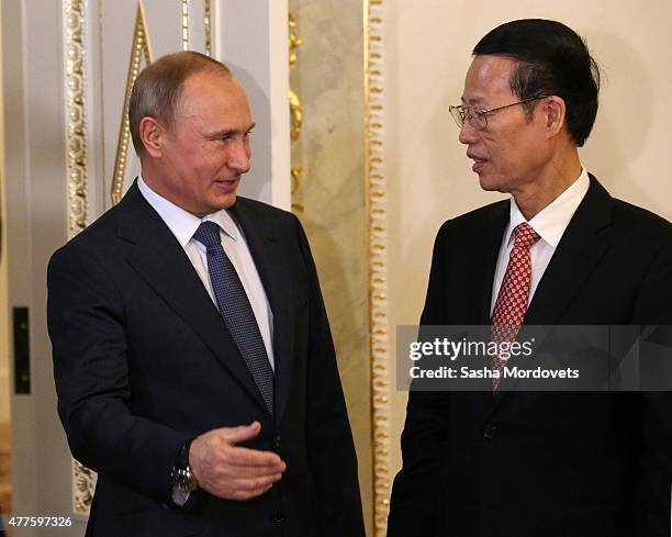Chinese Vice Prime Minister Zhang Gaoli attends a meeting with Russian President Vladimir Putin in the Konstantin Palace in Saint Petersburg, Russia,...